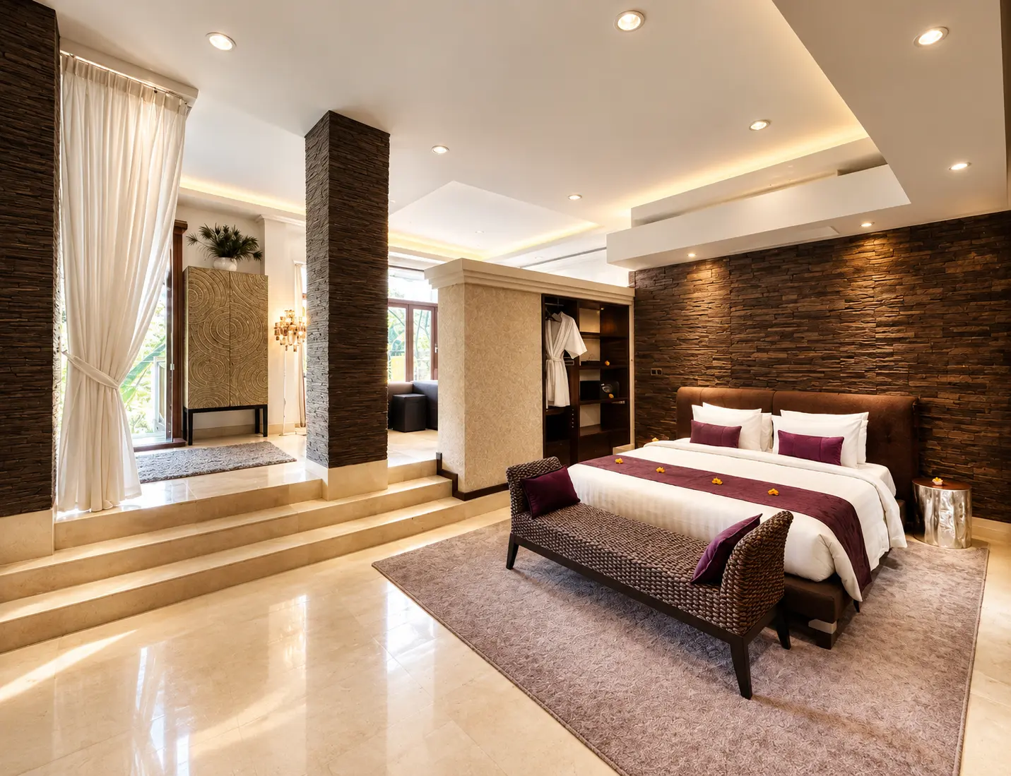 Studio Room 1 with a stone-textured feature wall, tall curtains and steps beside the bed